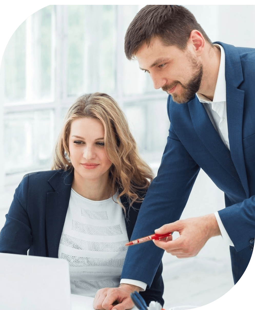 Brainspack LLP colleagues reviewing work on a laptop