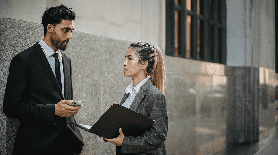 Fintech professionals reviewing a financial product